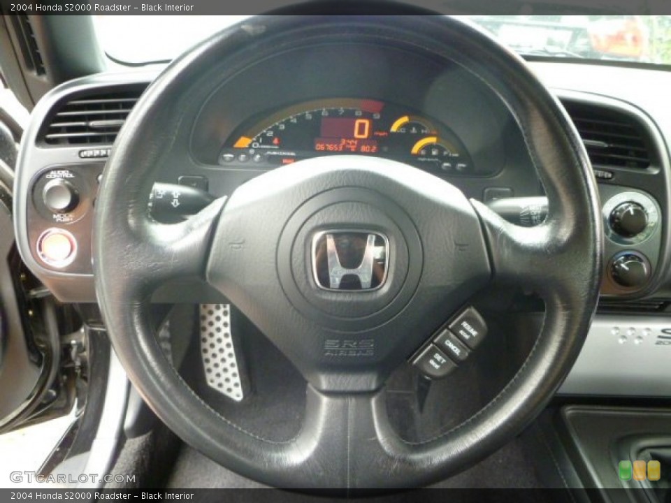 Black Interior Steering Wheel for the 2004 Honda S2000 Roadster #52461488