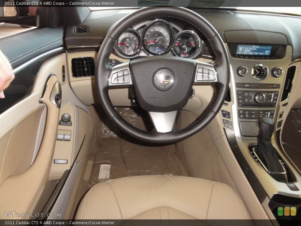 Cashmere/Cocoa Interior Dashboard for the 2011 Cadillac CTS 4 AWD Coupe #52468706