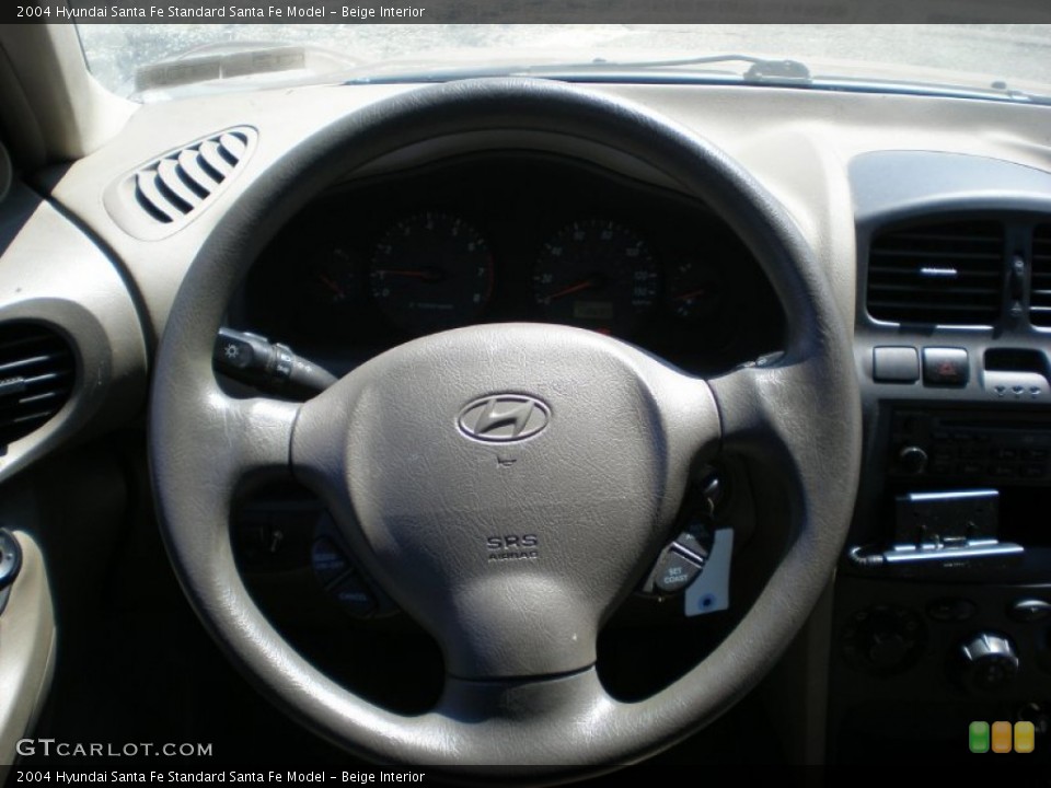 Beige Interior Steering Wheel for the 2004 Hyundai Santa Fe  #52481825