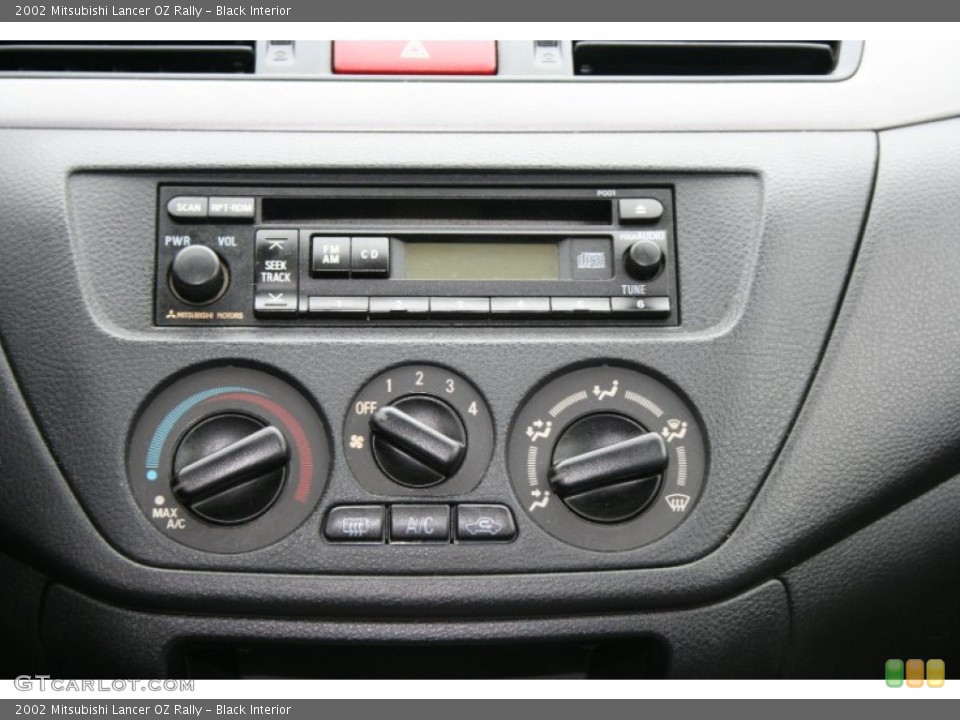 Black Interior Controls for the 2002 Mitsubishi Lancer OZ Rally #52494074