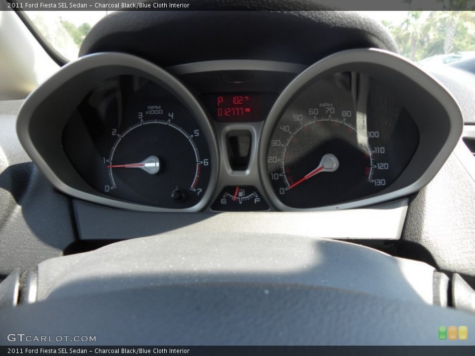 Charcoal Black/Blue Cloth Interior Gauges for the 2011 Ford Fiesta SEL Sedan #52503711