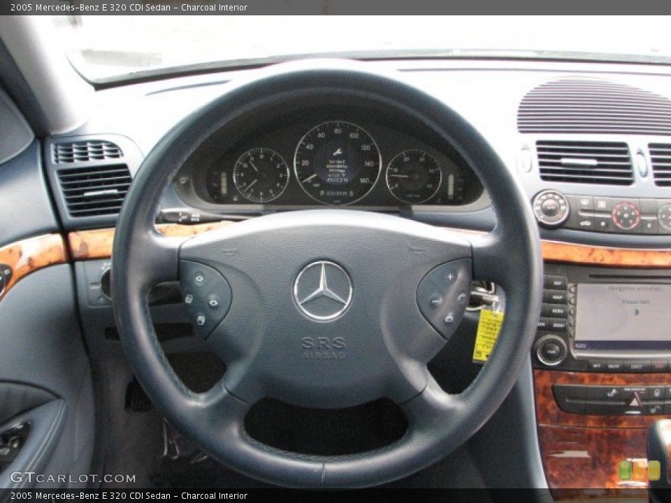 Charcoal Interior Steering Wheel for the 2005 Mercedes-Benz E 320 CDI Sedan #52512903