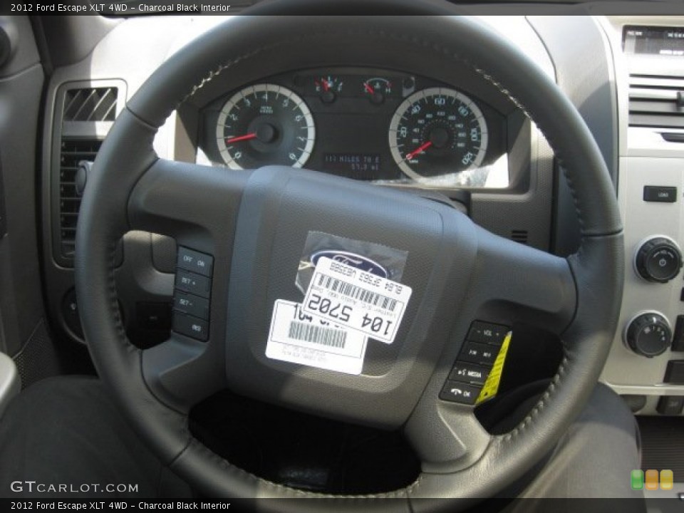 Charcoal Black Interior Steering Wheel for the 2012 Ford Escape XLT 4WD #52515357