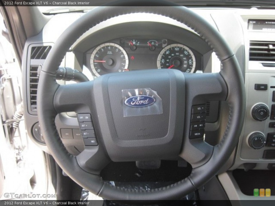 Charcoal Black Interior Steering Wheel for the 2012 Ford Escape XLT V6 #52516230