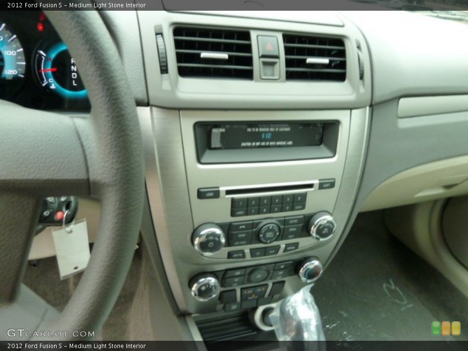 Medium Light Stone Interior Controls for the 2012 Ford Fusion S #52522290