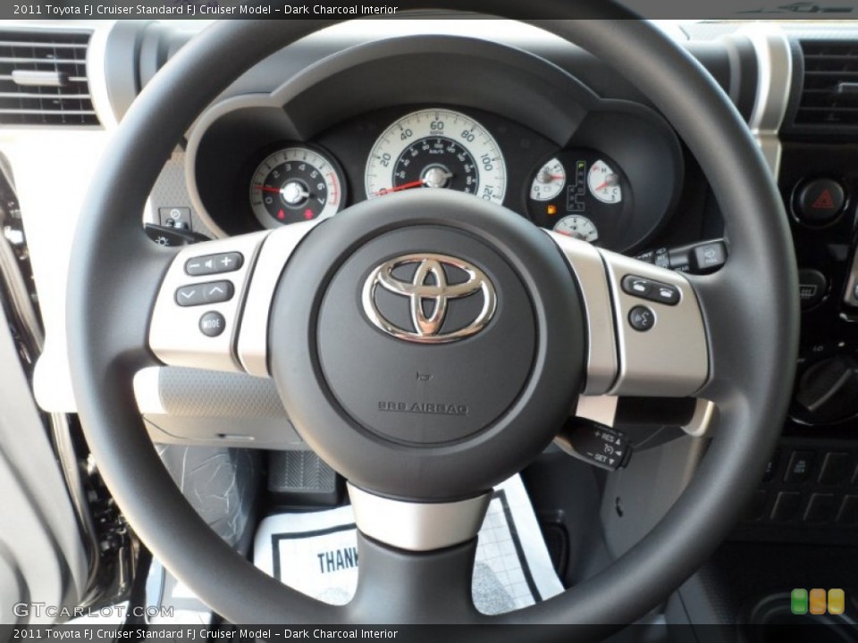 Dark Charcoal Interior Steering Wheel for the 2011 Toyota FJ Cruiser  #52526637