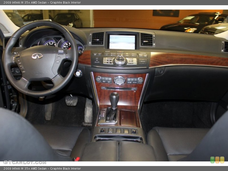 Graphite Black Interior Dashboard for the 2009 Infiniti M 35x AWD Sedan #52531305