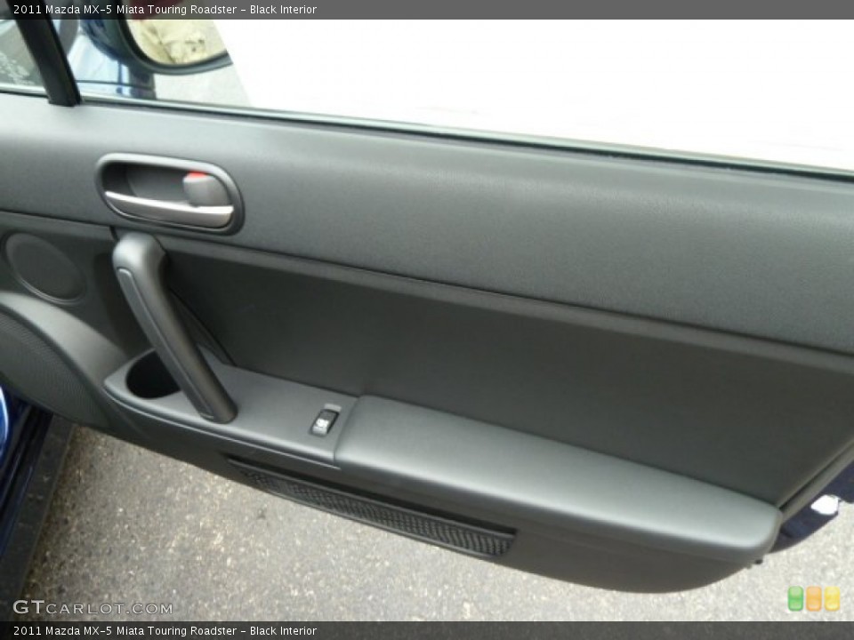 Black Interior Door Panel for the 2011 Mazda MX-5 Miata Touring Roadster #52533546