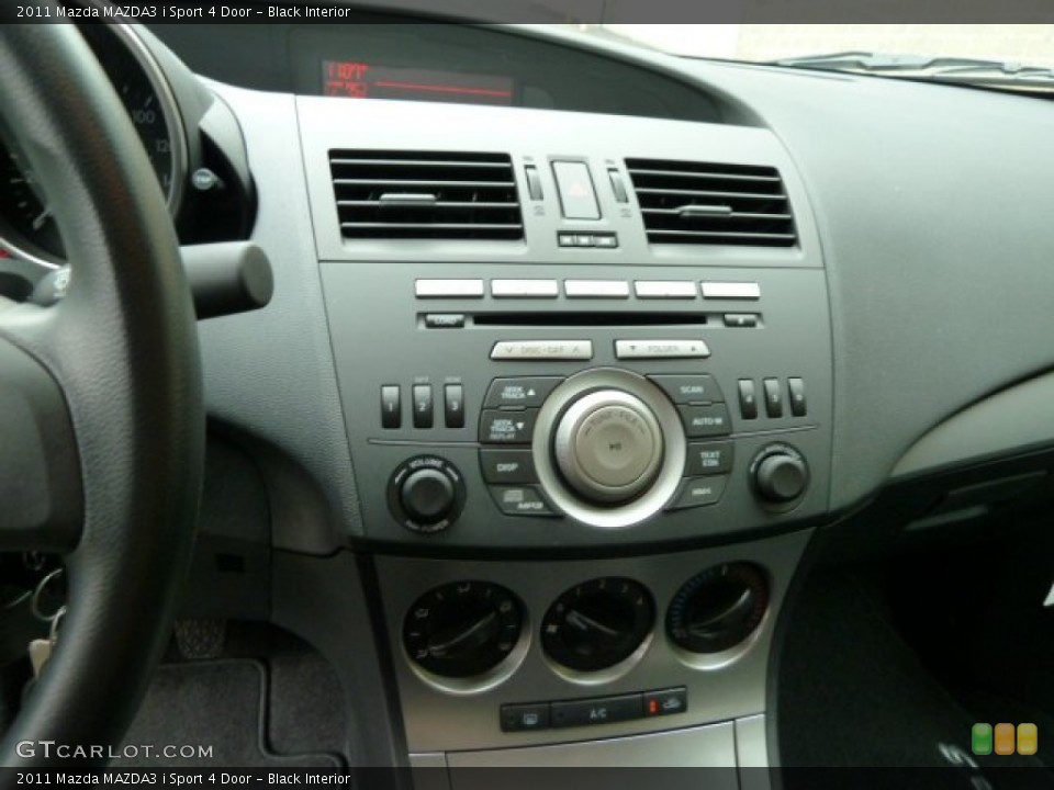 Black Interior Controls for the 2011 Mazda MAZDA3 i Sport 4 Door #52535097