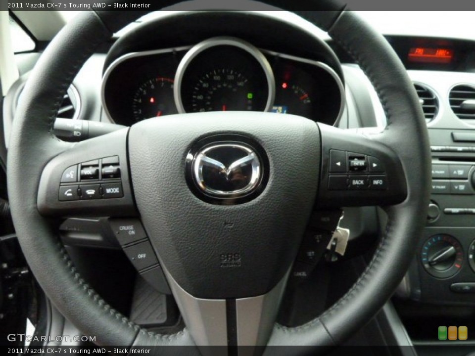 Black Interior Steering Wheel for the 2011 Mazda CX-7 s Touring AWD #52535364
