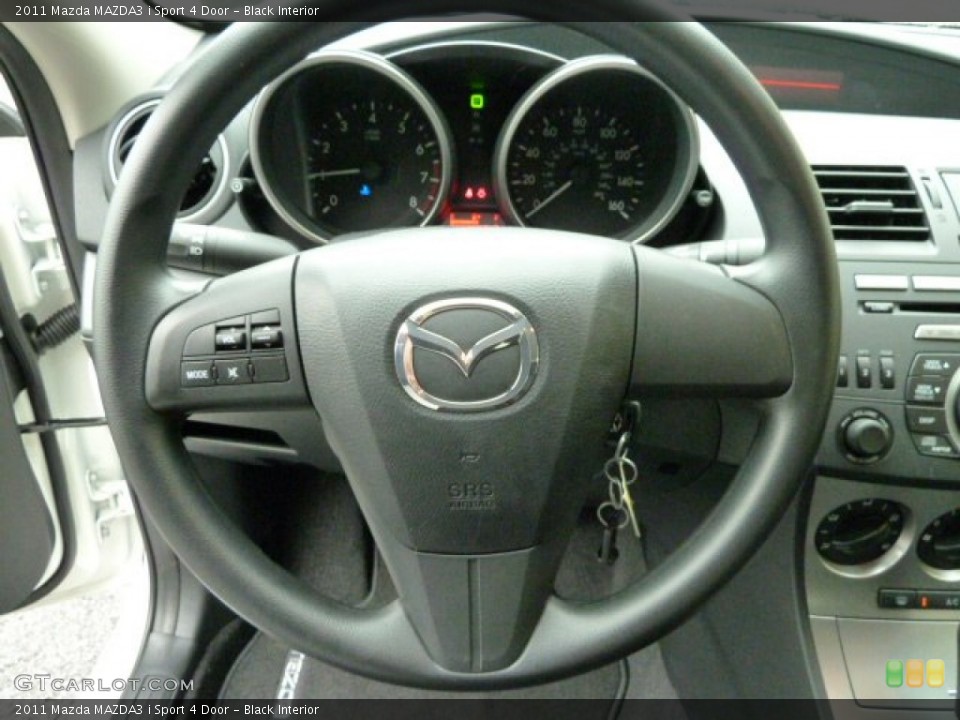 Black Interior Steering Wheel for the 2011 Mazda MAZDA3 i Sport 4 Door #52536165