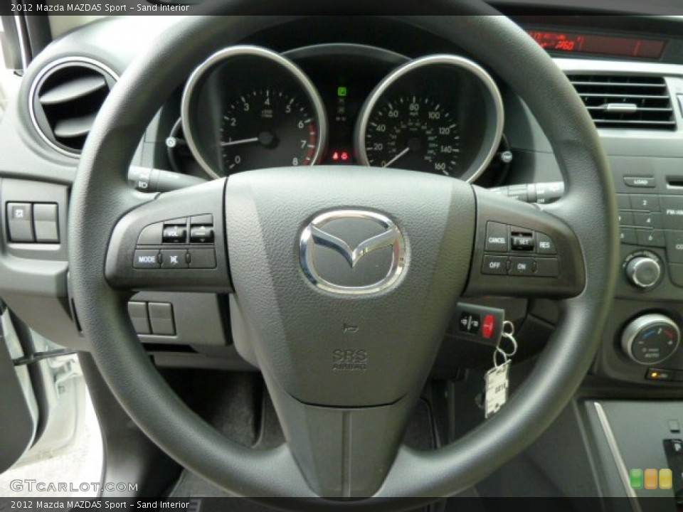 Sand Interior Steering Wheel for the 2012 Mazda MAZDA5 Sport #52537629