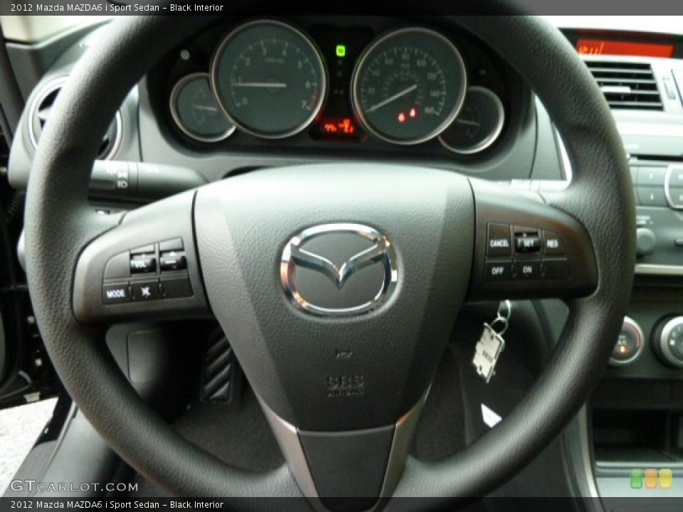 Black Interior Steering Wheel for the 2012 Mazda MAZDA6 i Sport Sedan #52537902