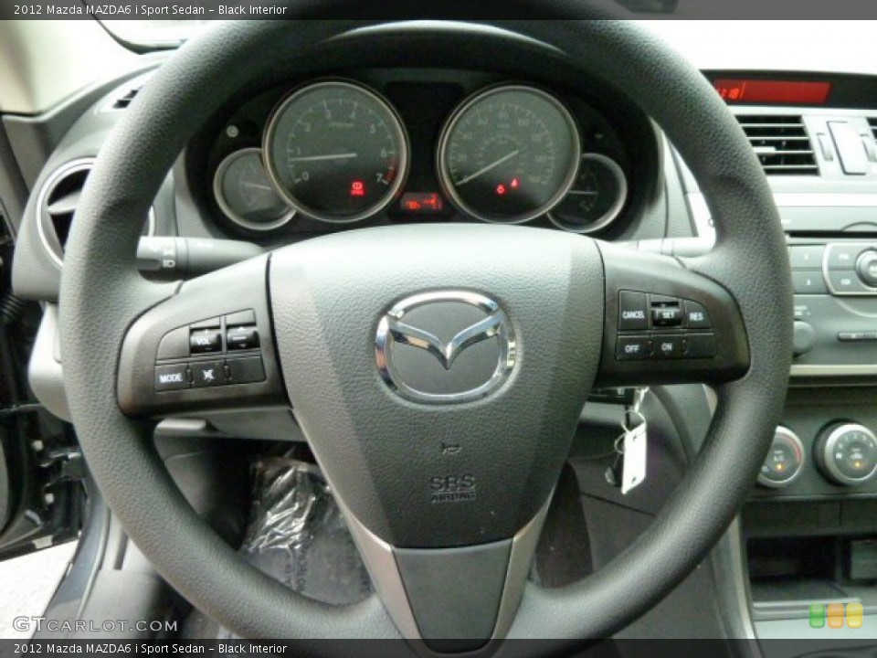 Black Interior Steering Wheel for the 2012 Mazda MAZDA6 i Sport Sedan #52538181