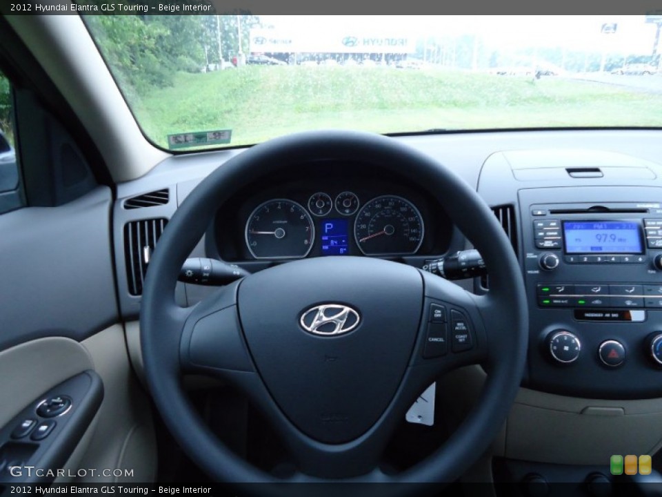 Beige Interior Dashboard for the 2012 Hyundai Elantra GLS Touring #52544730