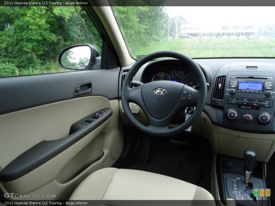 Beige Interior Dashboard for the 2012 Hyundai Elantra GLS Touring #52544781