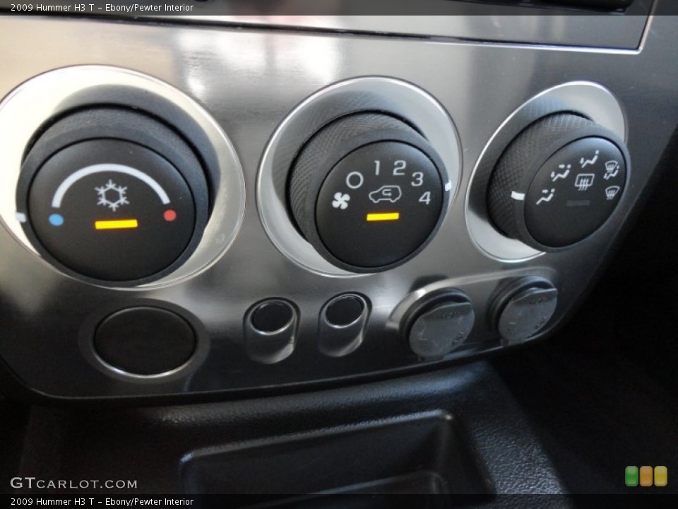 Ebony/Pewter Interior Controls for the 2009 Hummer H3 T #52546779