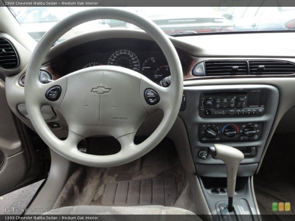 Medium Oak Interior Dashboard for the 1999 Chevrolet Malibu Sedan #52578710