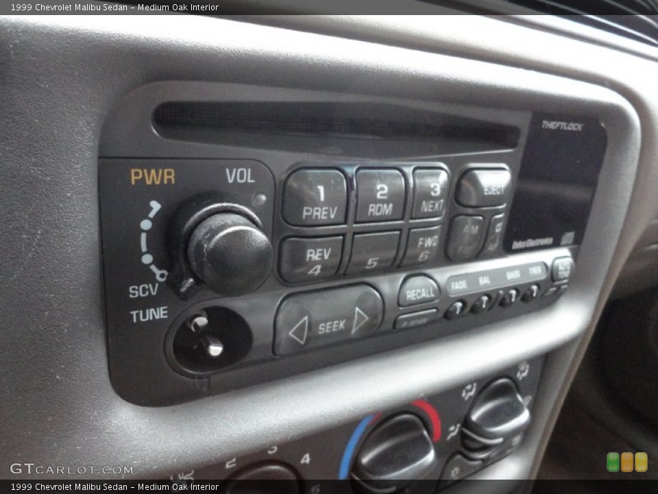 Medium Oak Interior Controls for the 1999 Chevrolet Malibu Sedan #52578836