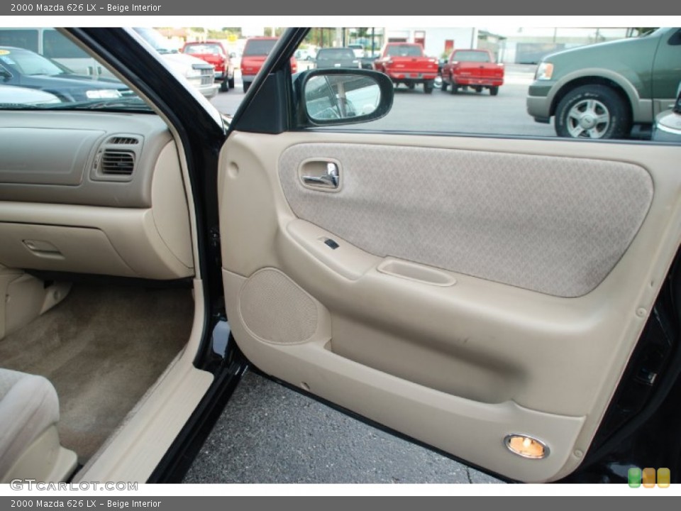 Beige Interior Door Panel for the 2000 Mazda 626 LX #52579889