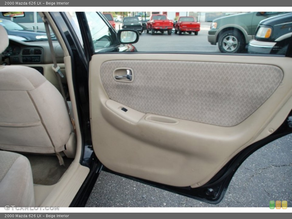 Beige Interior Door Panel for the 2000 Mazda 626 LX #52579957