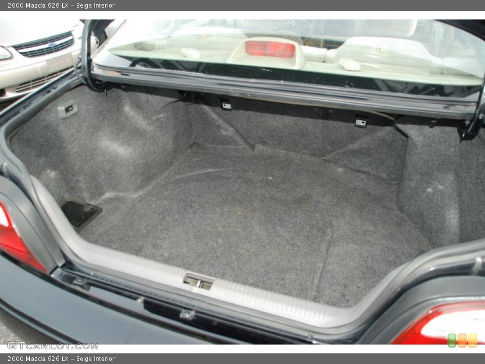 Beige Interior Trunk for the 2000 Mazda 626 LX #52579997