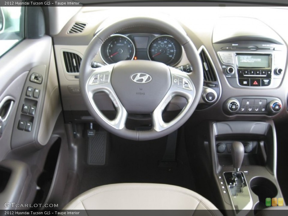 Taupe Interior Dashboard for the 2012 Hyundai Tucson GLS #52583516