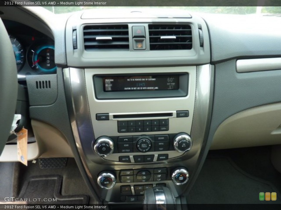 Medium Light Stone Interior Controls for the 2012 Ford Fusion SEL V6 AWD #52616978