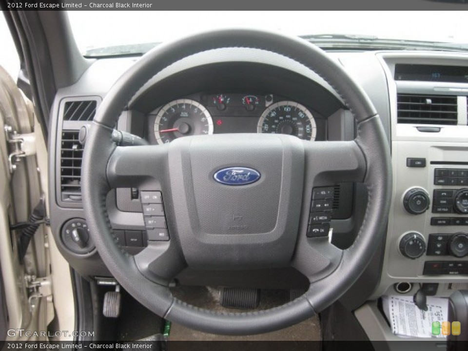 Charcoal Black Interior Steering Wheel for the 2012 Ford Escape Limited #52617263