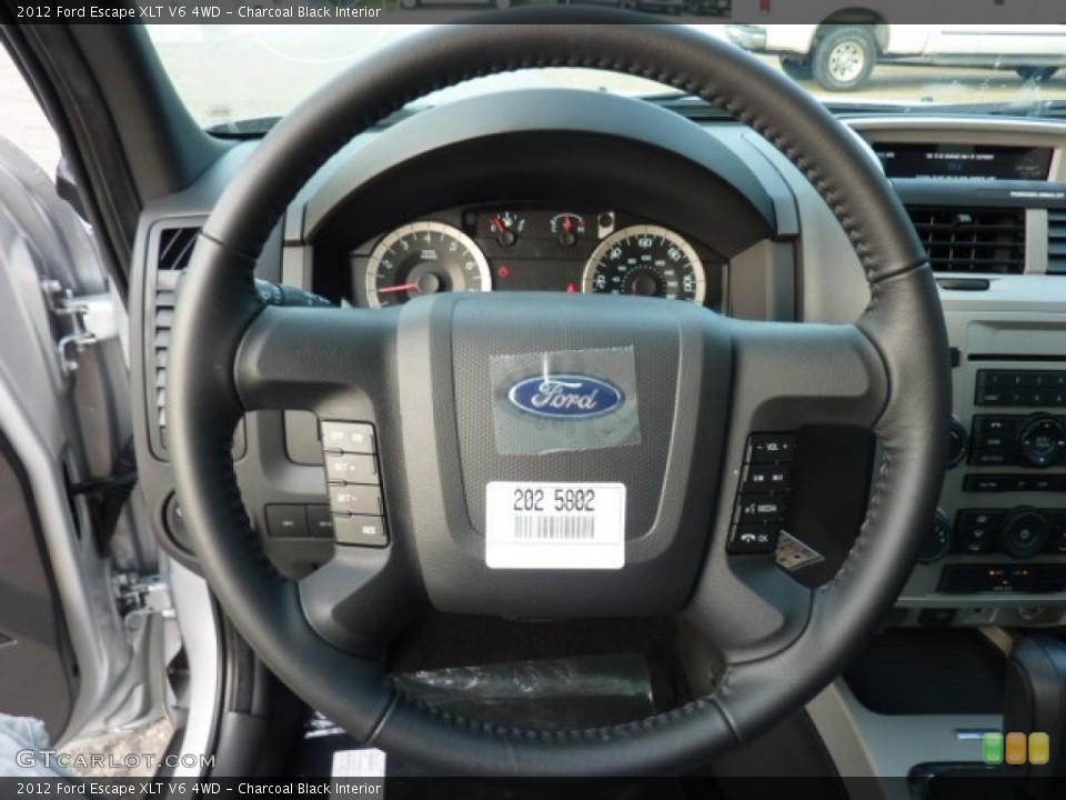 Charcoal Black Interior Steering Wheel for the 2012 Ford Escape XLT V6 4WD #52619999