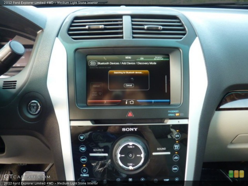 Medium Light Stone Interior Controls for the 2012 Ford Explorer Limited 4WD #52620323