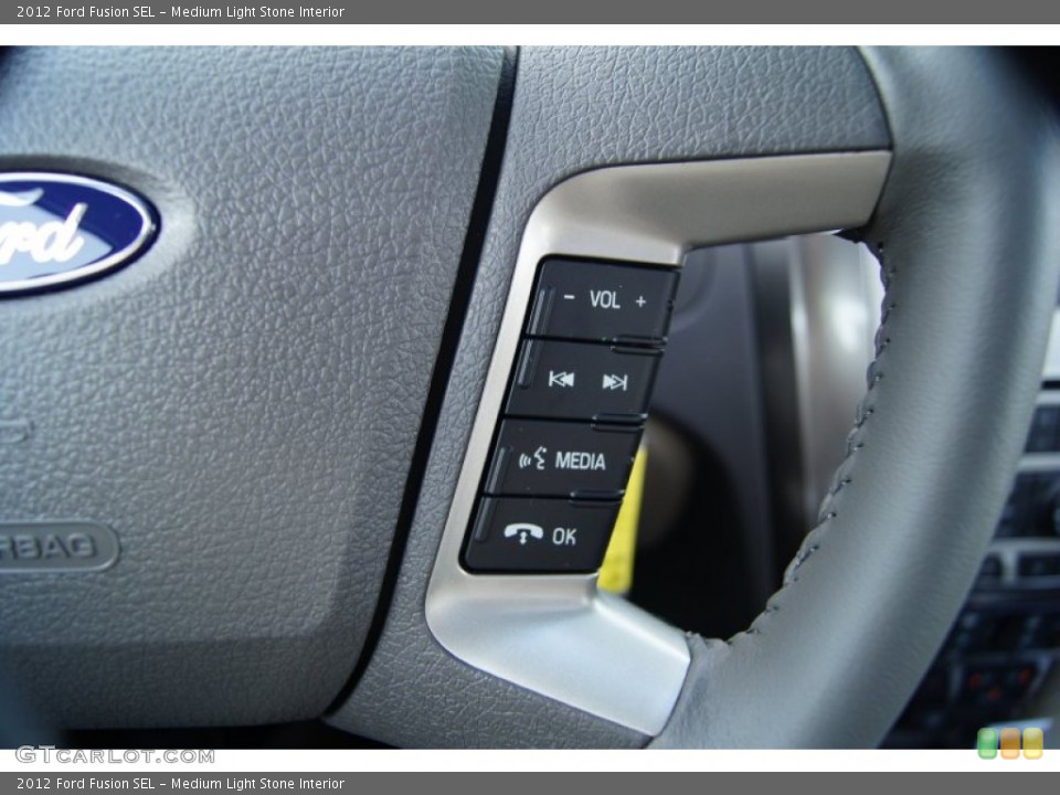 Medium Light Stone Interior Controls for the 2012 Ford Fusion SEL #52623905