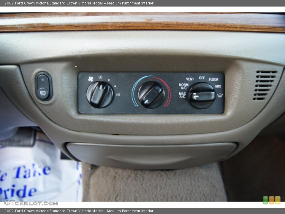Medium Parchment Interior Controls for the 2002 Ford Crown Victoria  #52626623