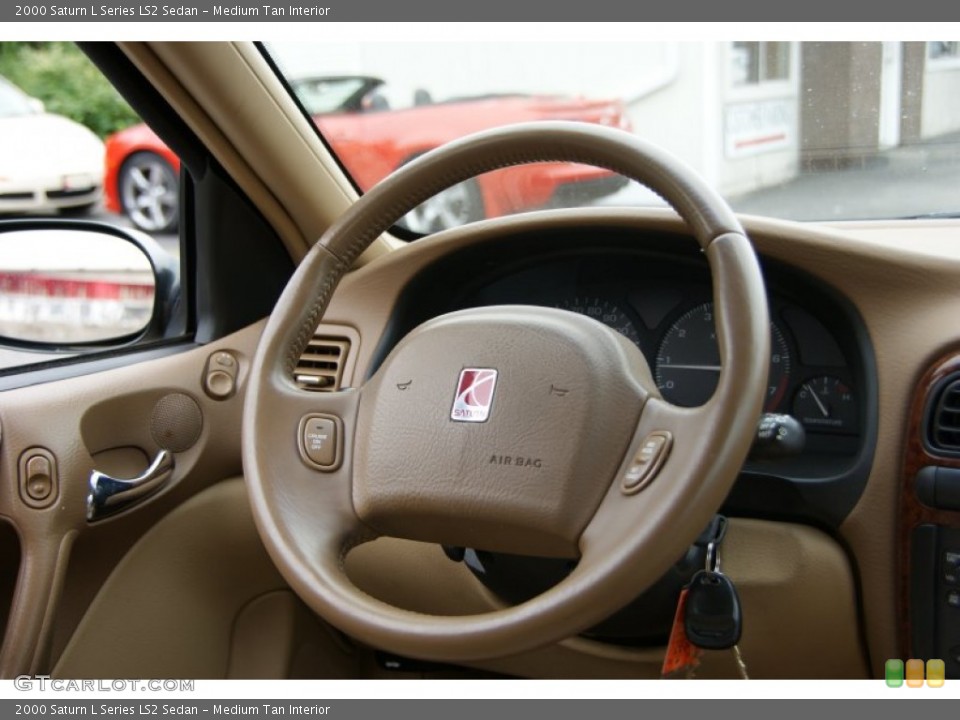 Medium Tan Interior Steering Wheel for the 2000 Saturn L Series LS2 Sedan #52672828