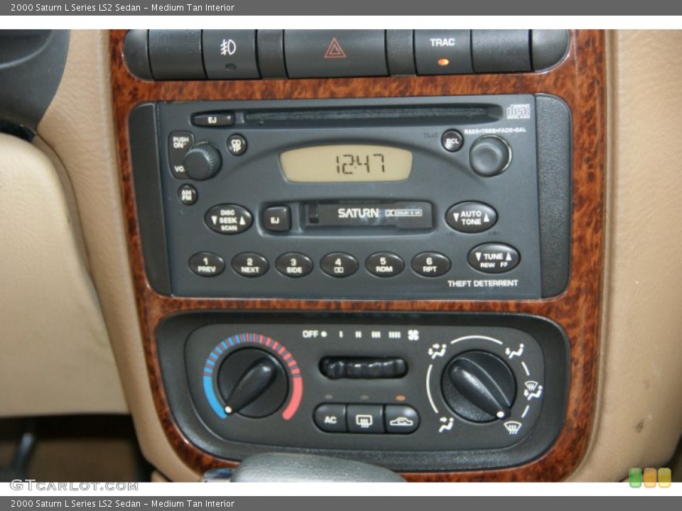 Medium Tan Interior Controls for the 2000 Saturn L Series LS2 Sedan #52672852