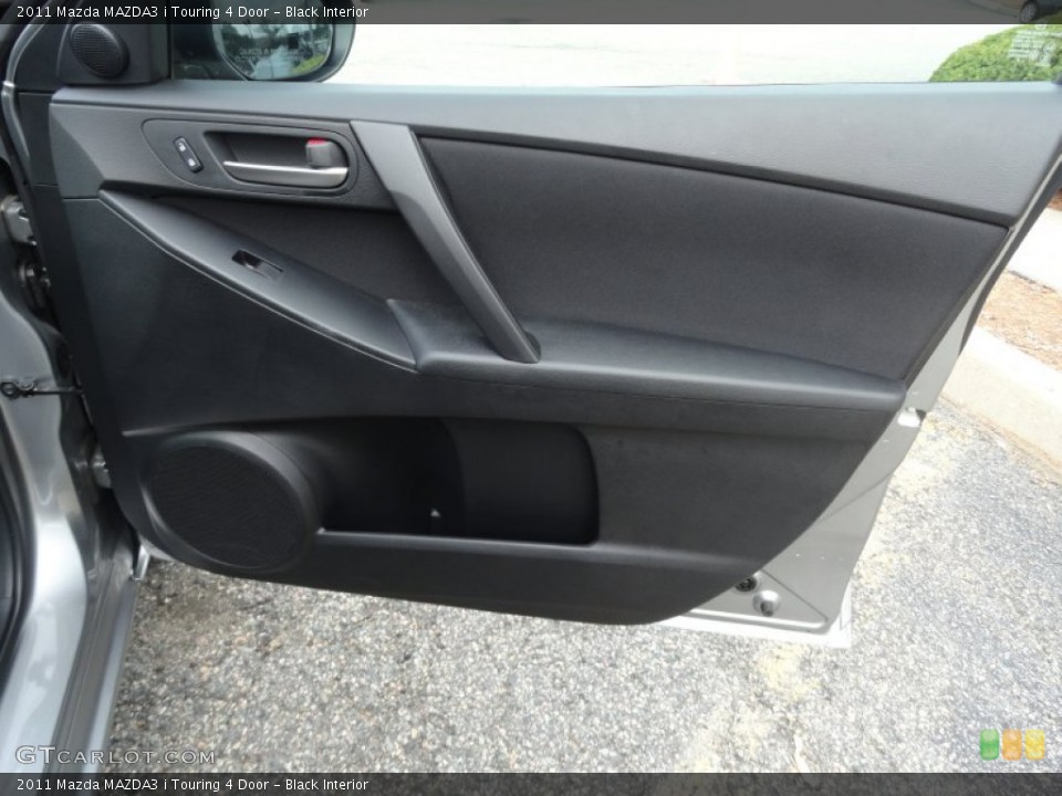 Black Interior Door Panel for the 2011 Mazda MAZDA3 i Touring 4 Door #52673269