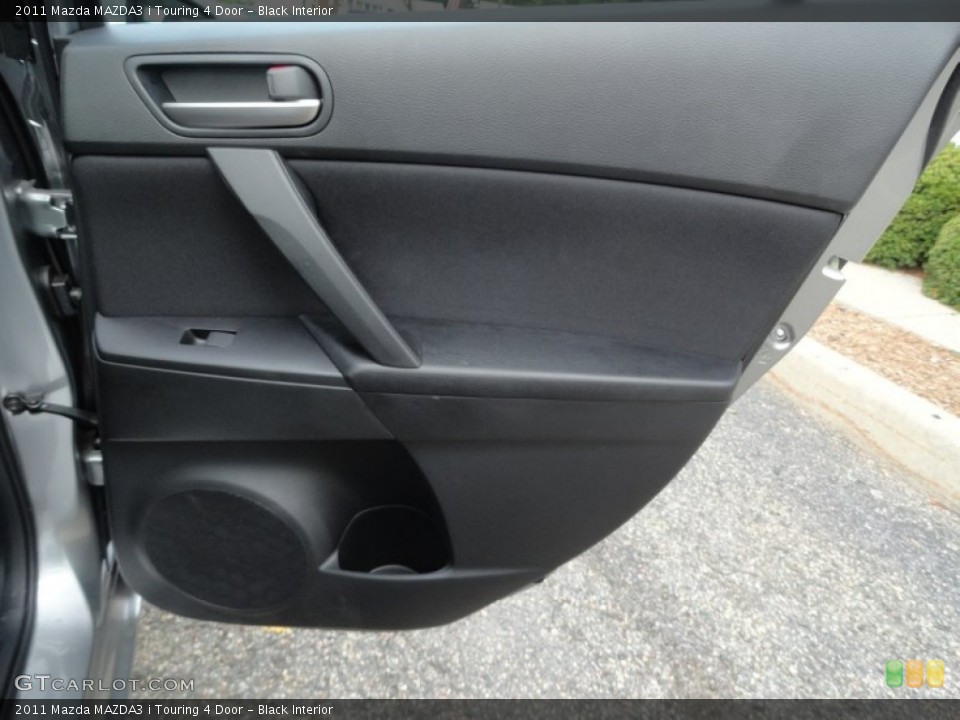 Black Interior Door Panel for the 2011 Mazda MAZDA3 i Touring 4 Door #52673305