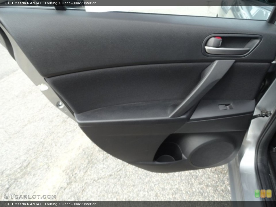 Black Interior Door Panel for the 2011 Mazda MAZDA3 i Touring 4 Door #52673341