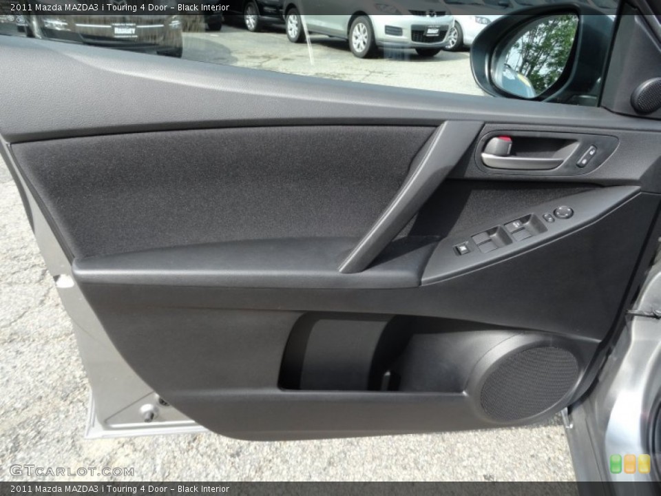 Black Interior Door Panel for the 2011 Mazda MAZDA3 i Touring 4 Door #52673365