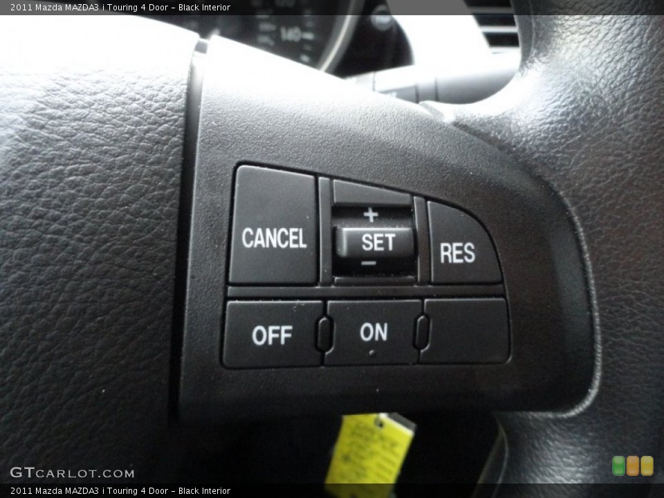 Black Interior Controls for the 2011 Mazda MAZDA3 i Touring 4 Door #52673440
