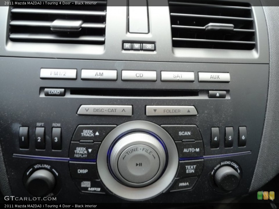 Black Interior Controls for the 2011 Mazda MAZDA3 i Touring 4 Door #52673488