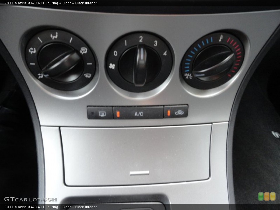 Black Interior Controls for the 2011 Mazda MAZDA3 i Touring 4 Door #52673497