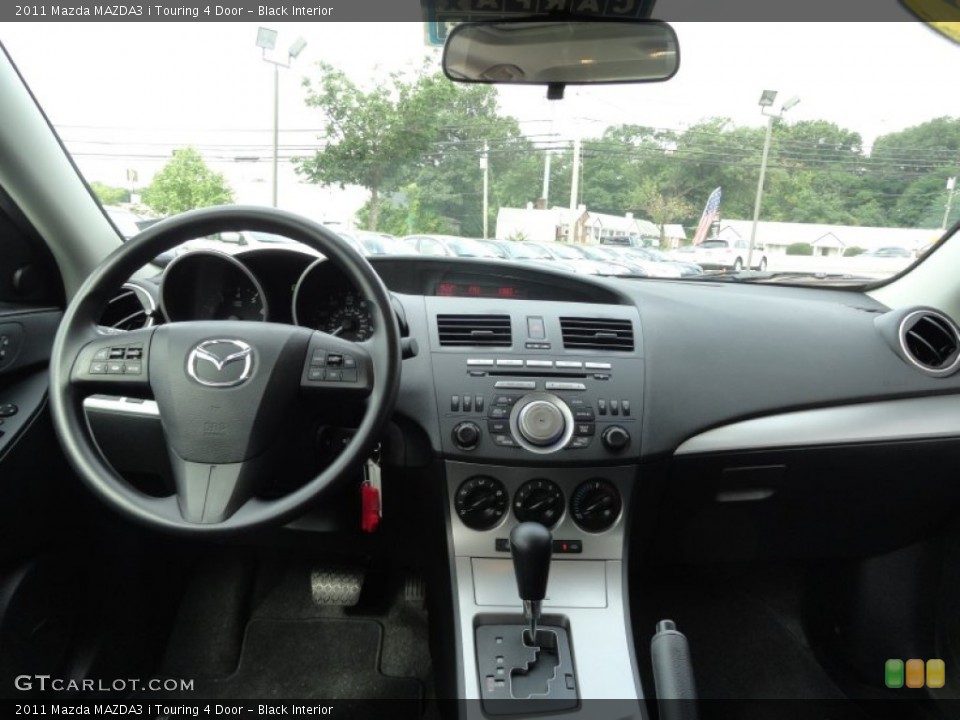 Black Interior Dashboard for the 2011 Mazda MAZDA3 i Touring 4 Door #52674160