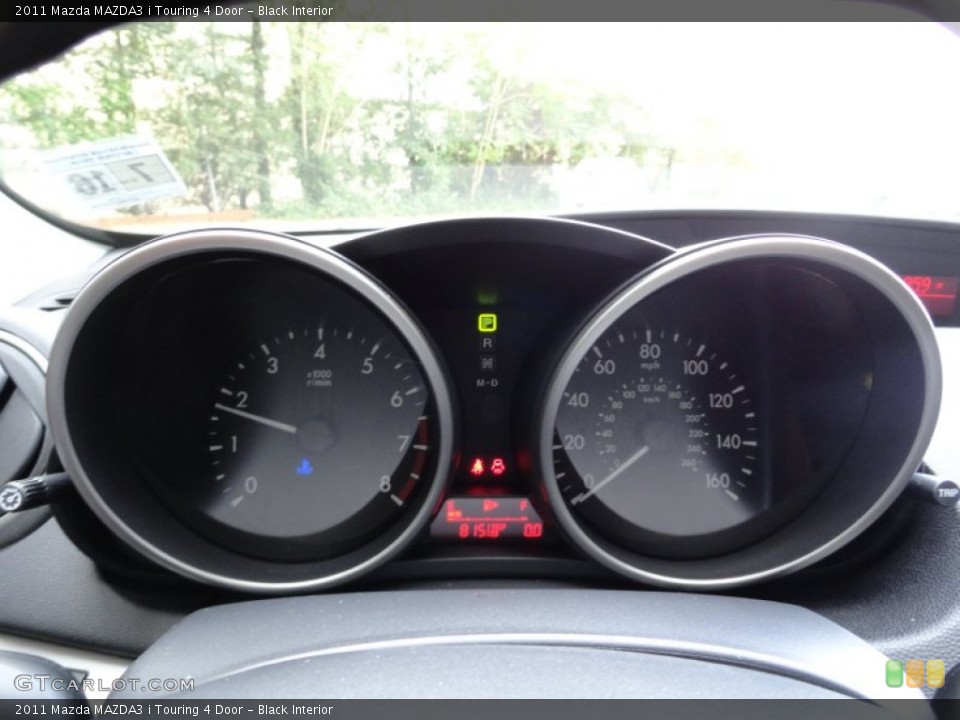 Black Interior Gauges for the 2011 Mazda MAZDA3 i Touring 4 Door #52674886