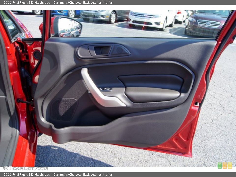 Cashmere/Charcoal Black Leather Interior Door Panel for the 2011 Ford Fiesta SES Hatchback #52691484