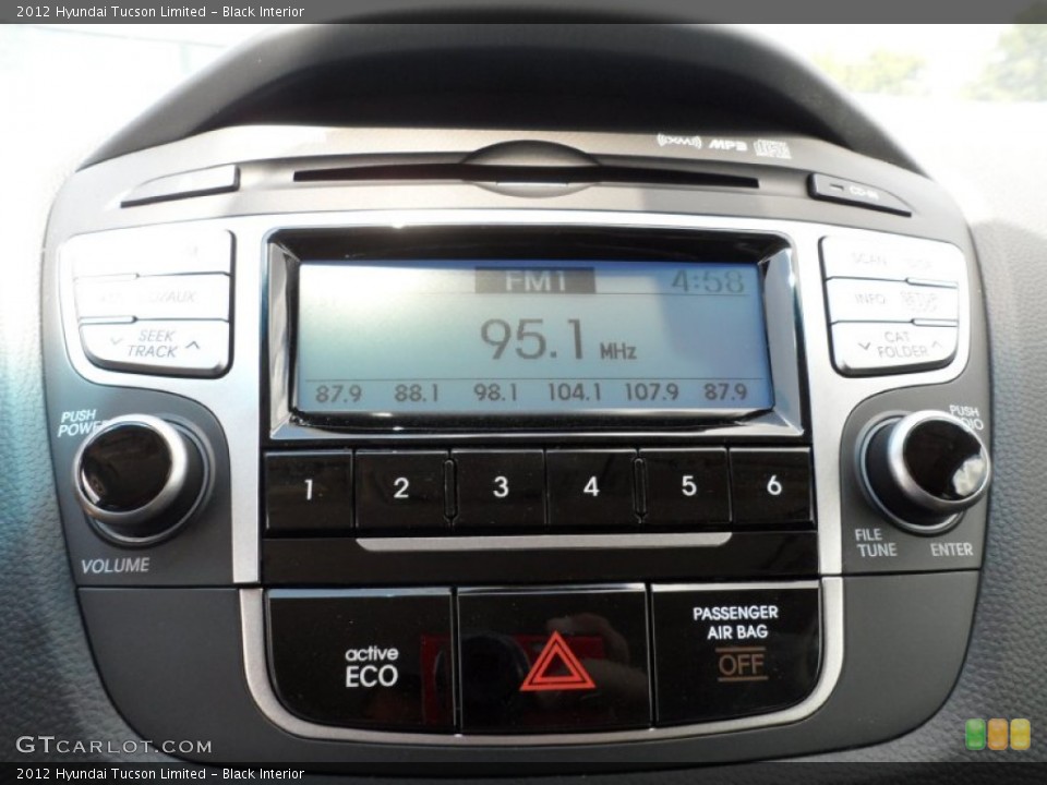 Black Interior Controls for the 2012 Hyundai Tucson Limited #52693266