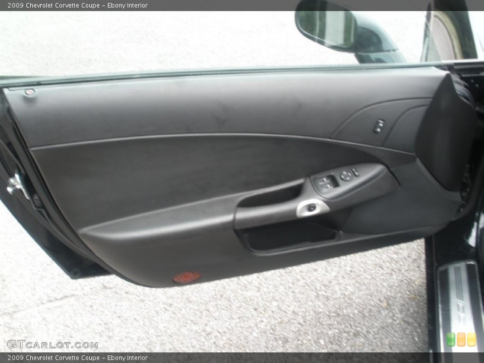 Ebony Interior Door Panel for the 2009 Chevrolet Corvette Coupe #52701141