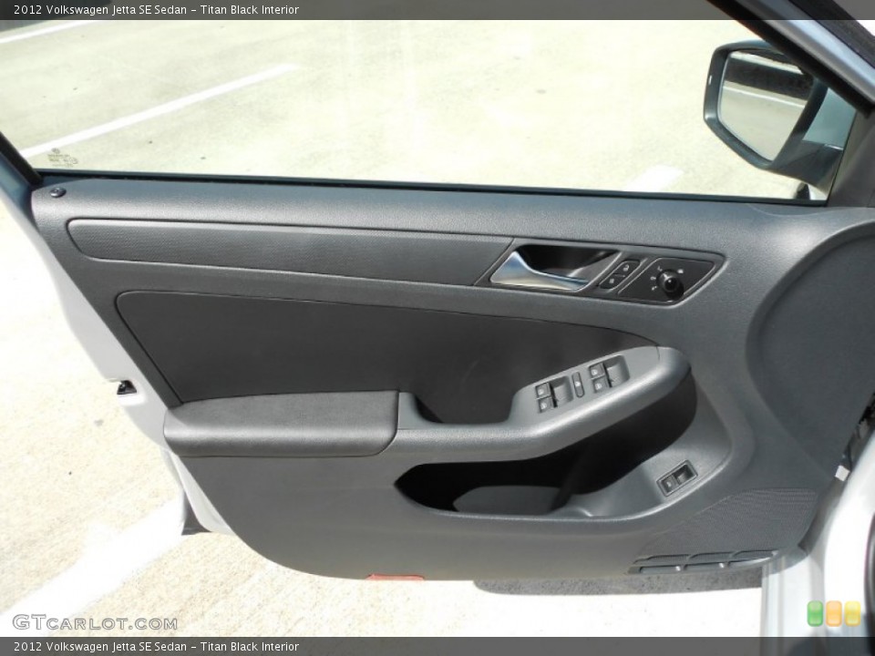 Titan Black Interior Door Panel for the 2012 Volkswagen Jetta SE Sedan #52705353