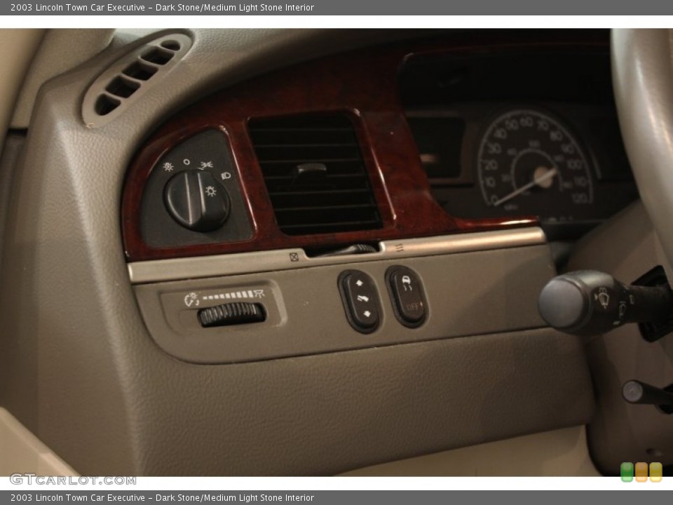 Dark Stone/Medium Light Stone Interior Controls for the 2003 Lincoln Town Car Executive #52718448