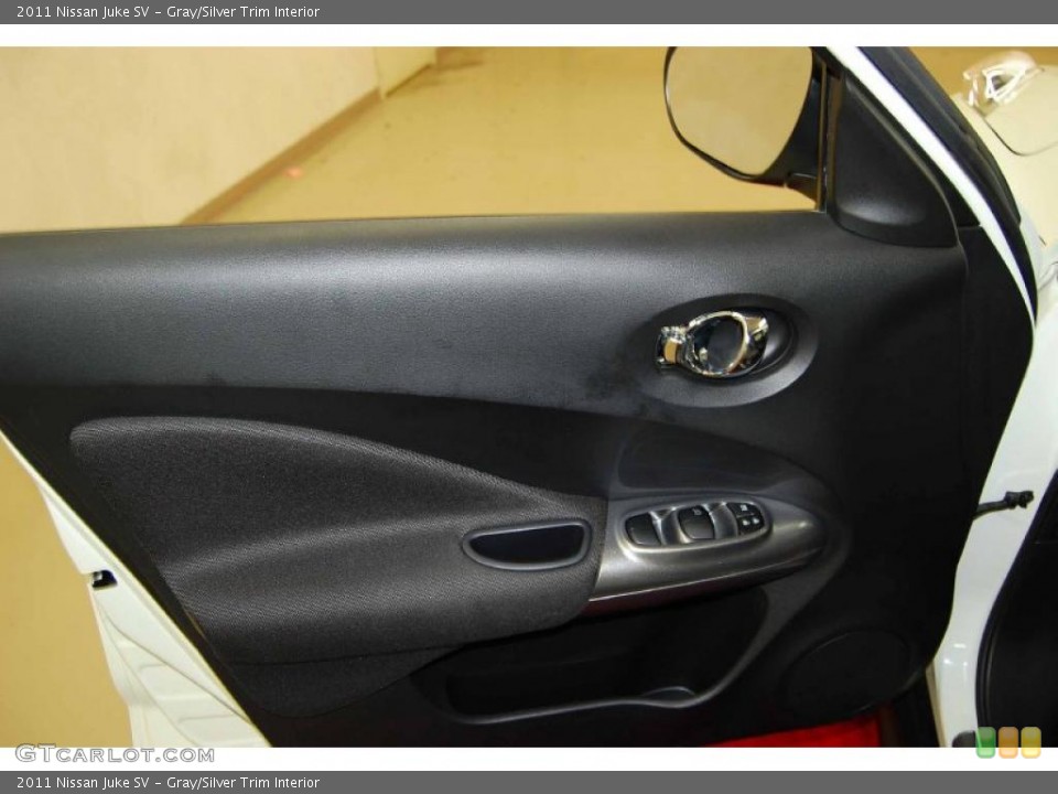 Gray/Silver Trim Interior Door Panel for the 2011 Nissan Juke SV #52786880